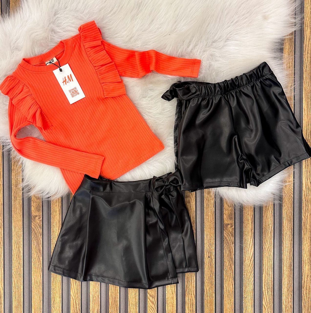 turuncu bluz deri şort etek takım